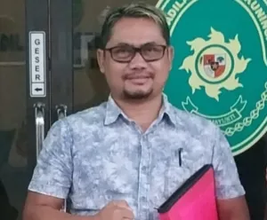 Advokat E.suherna Sh. Se