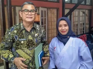 Kadisdik Kuningan Berama Heni E.silastri